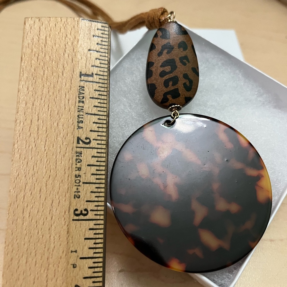 Tan necklace with leopard print medallion